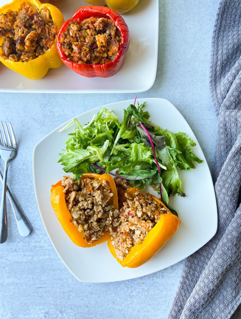 Paleo stuffed peppers served with salad